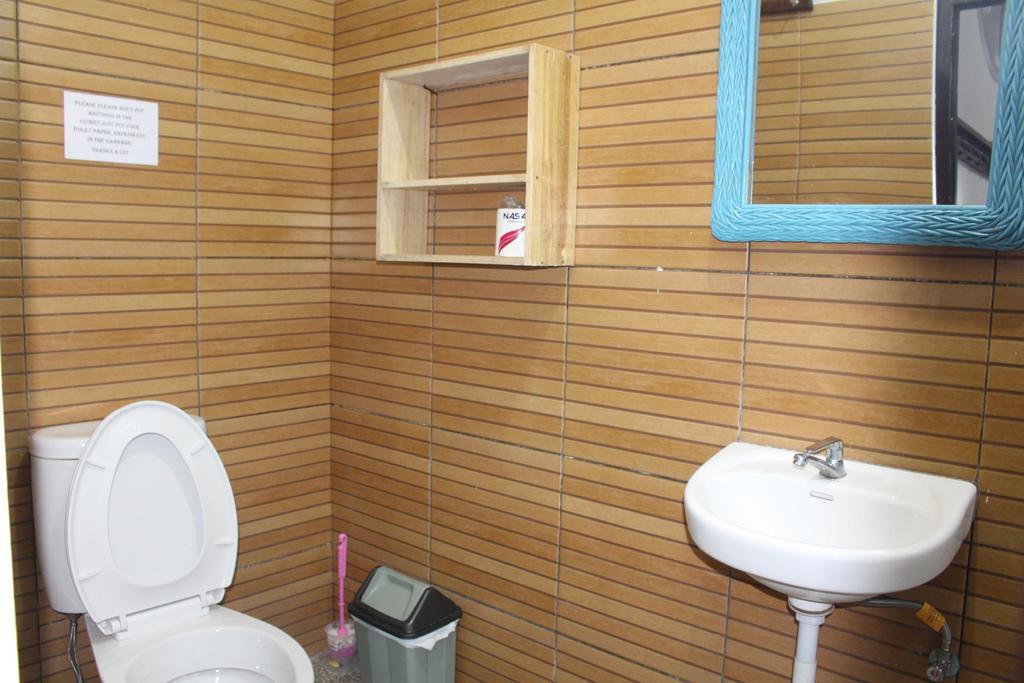 Mini Tiga Homestay Пангандаран Номер фото